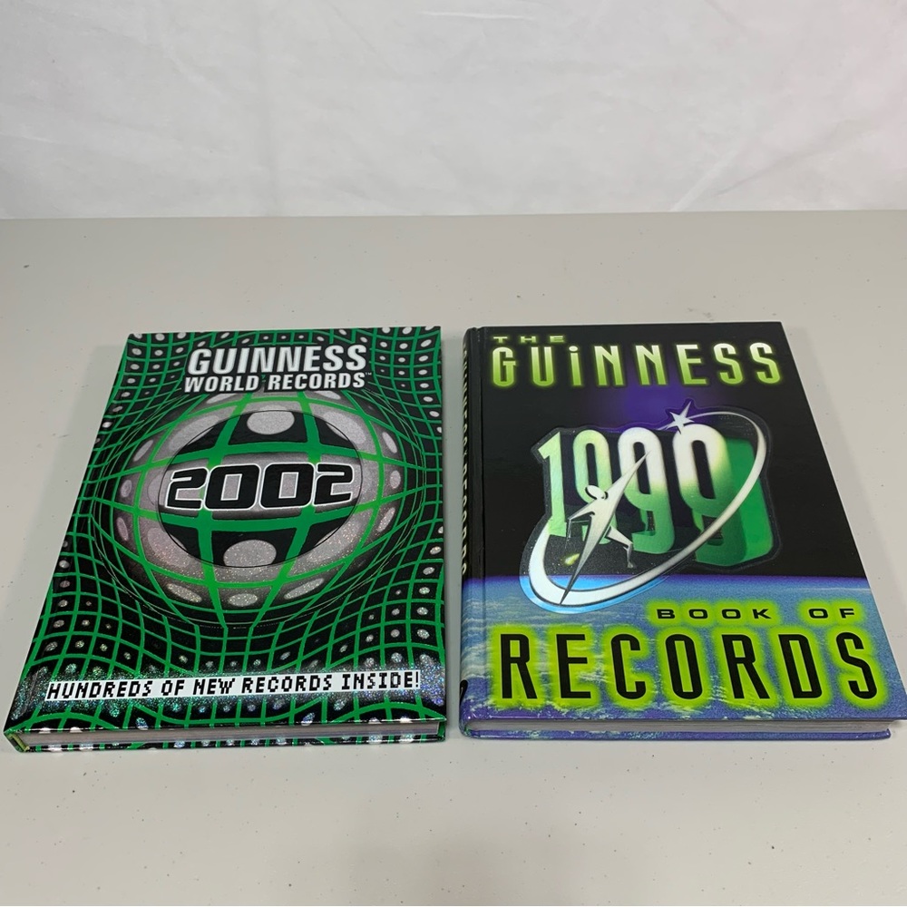 Guinness World Records 2Hardbound books- the Guiness book of Records 1999 & 2002